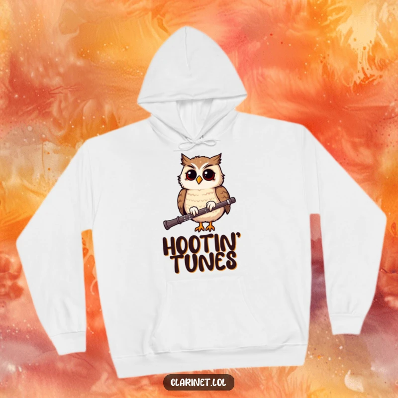 Funny hoodie featuring a giggling owl bobbing rhythmically on a clarinet, offering cozy comfort and a humorous musical theme.